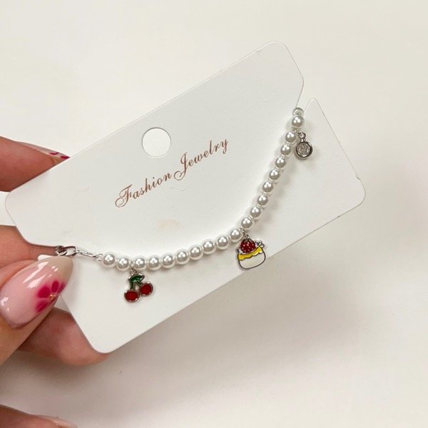 Producto - Pulsera perlas con dijes