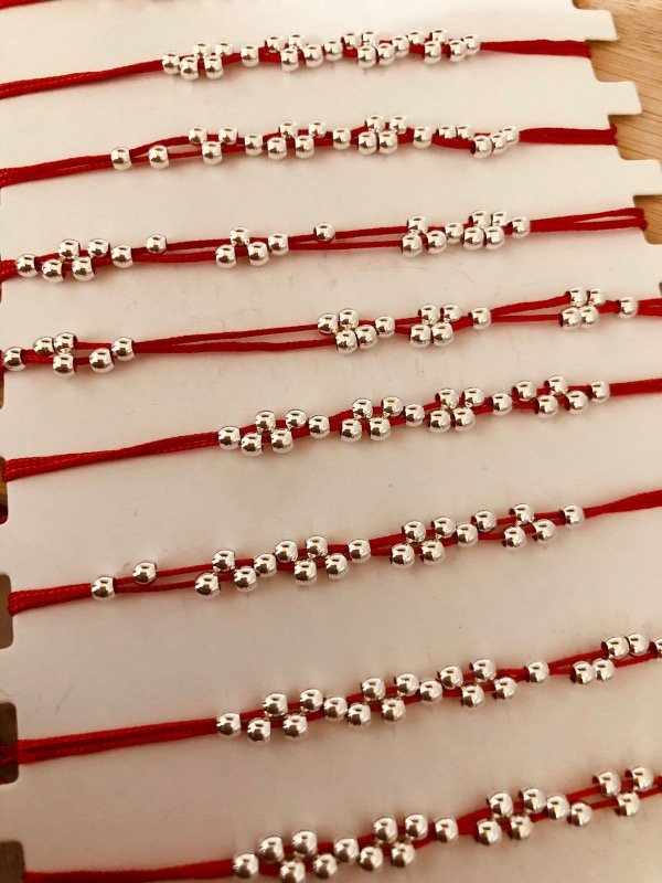 Producto - Pulseras Lisboa Rojas x 12 unidades Blíster Acero Blanco