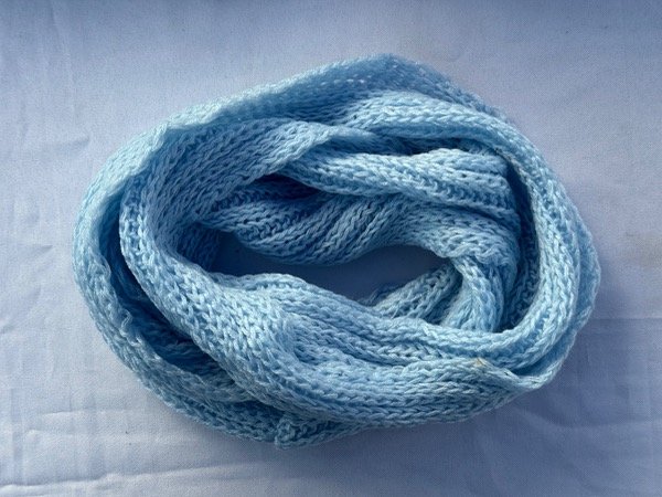 Producto - INFINITA DE LANA COLOR CELESTE