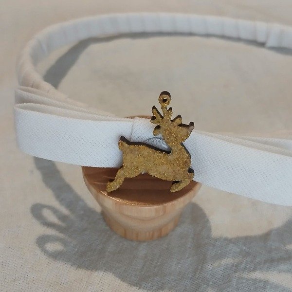 Producto - Vincha con moño blanco y reno