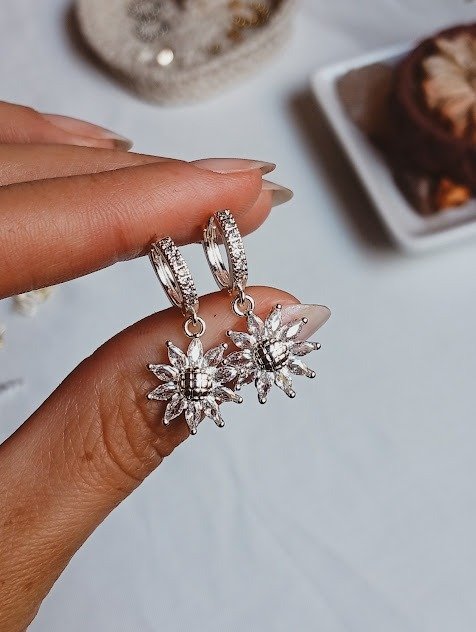 Producto - Argollitas flor - Acero blanco
