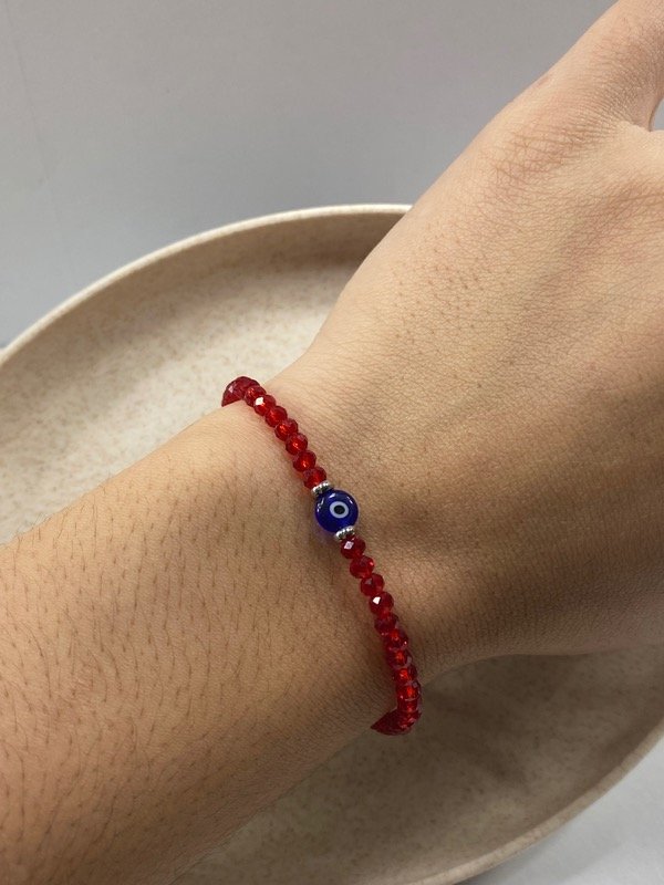 Producto - Puls. Ojo turco cristales