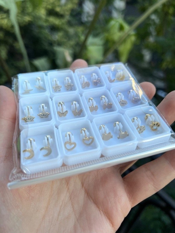 Producto - 12 pares de abridores de acero dorado