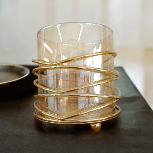 Producto - Porta vela vidrio fumé con adornos metalalicos