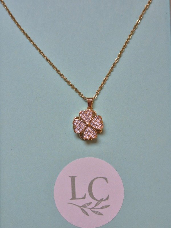 Producto - Collar giratorio trébol dorado