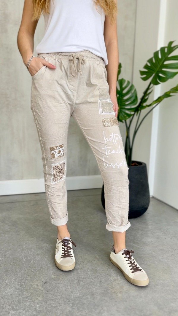 Producto - Babucha italiana con apliques botton arena