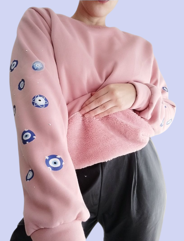 Producto - Buzo de corderito rosa "OJITOS PROTECTORES"