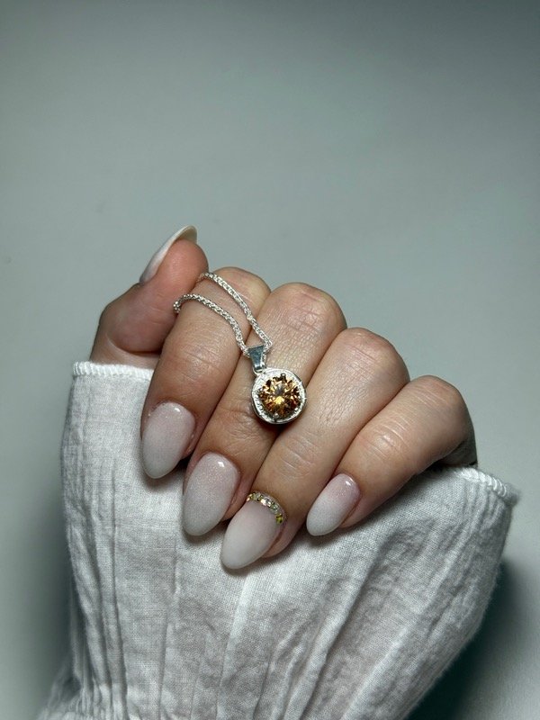 Producto - Dije piedra dorada circular - 2
