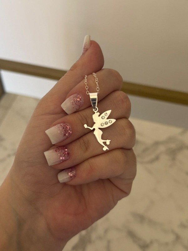 Producto - Cadena con dije TINKER acero blanco