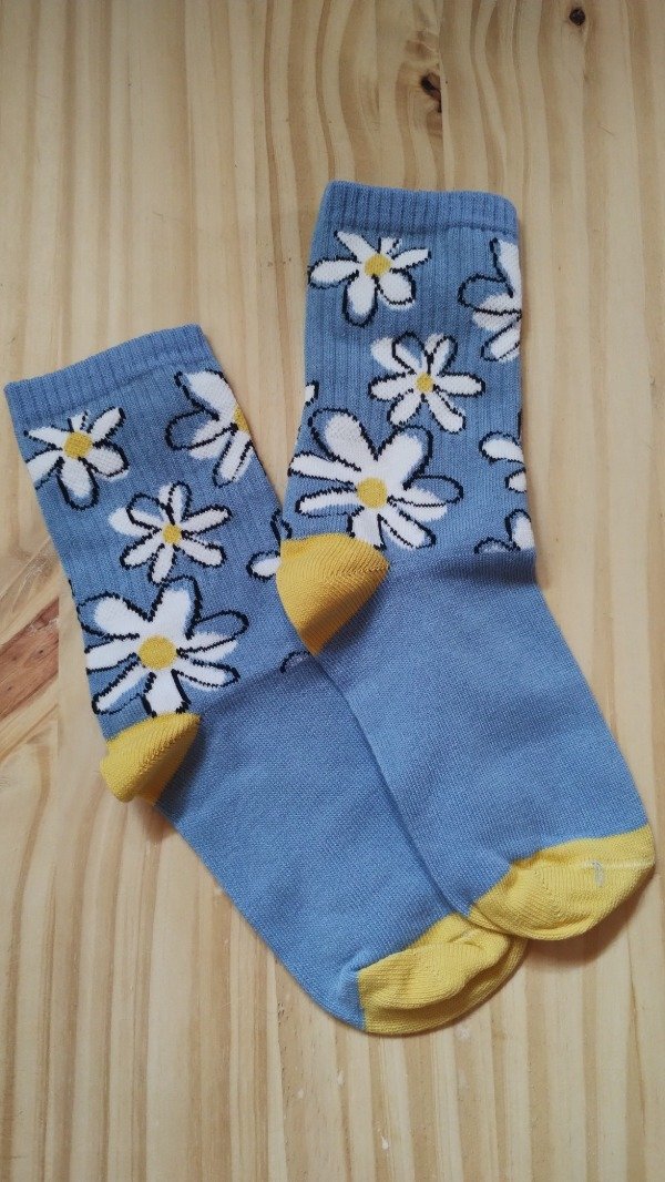 Producto - Flores ,fondo celeste