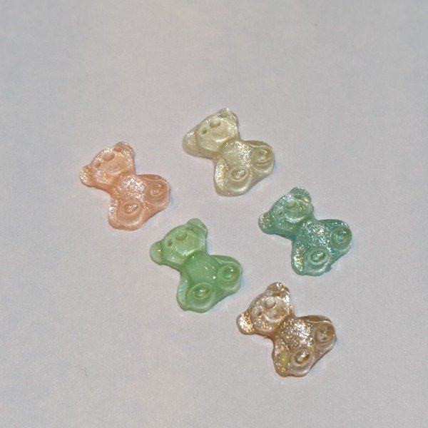 Producto - Dije osito con glitter