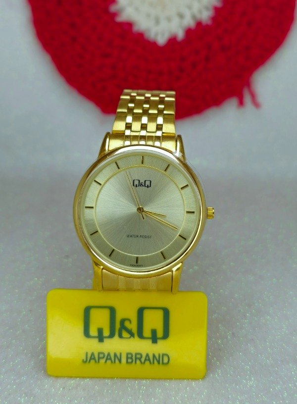 Producto - Reloj hombre dorado