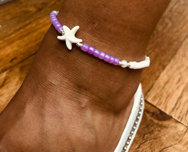 Producto - Tobi estrella de mar nácar Plata