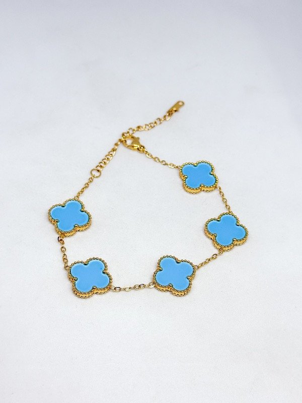 Producto - Pulsera acero dorado van cleef piedra celeste