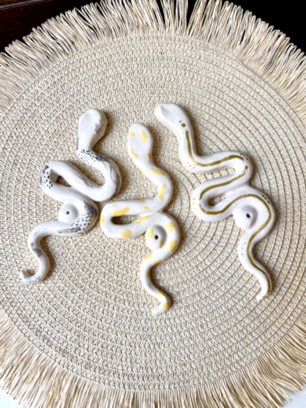 Producto - Portasahumerio serpientes