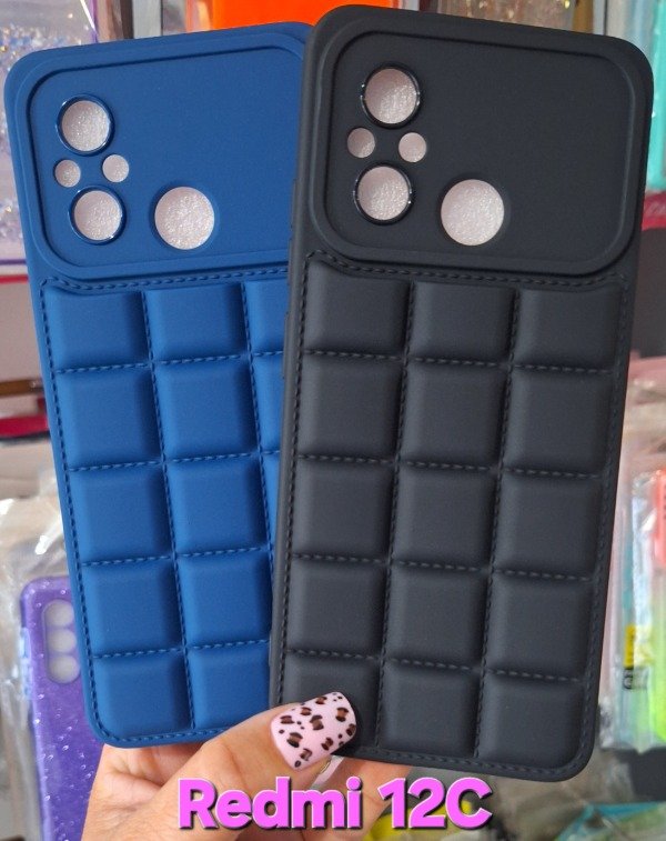 Producto - Fundas puffer chocolate. Redmi 12C