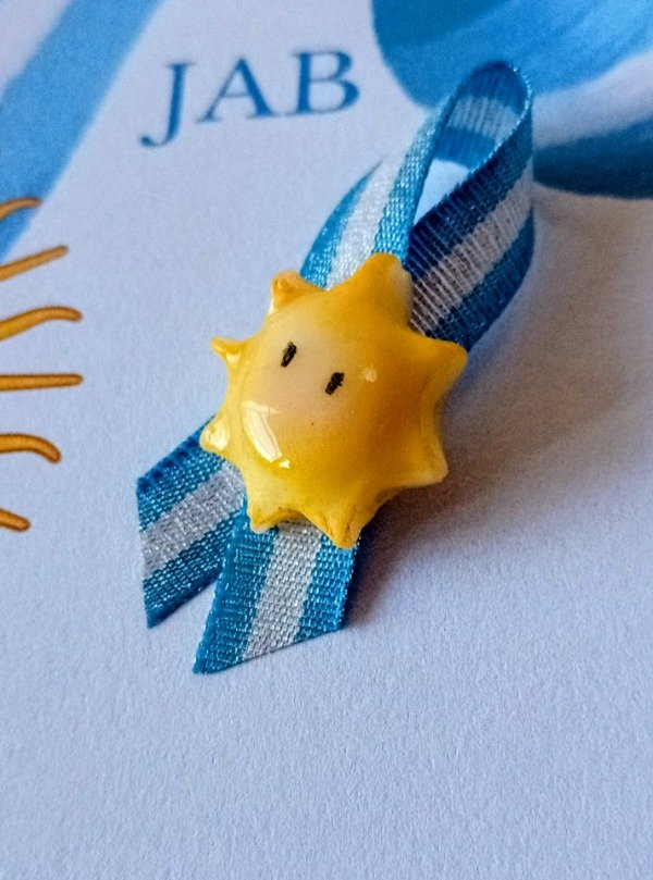 Producto - Escarapela sol kawaii