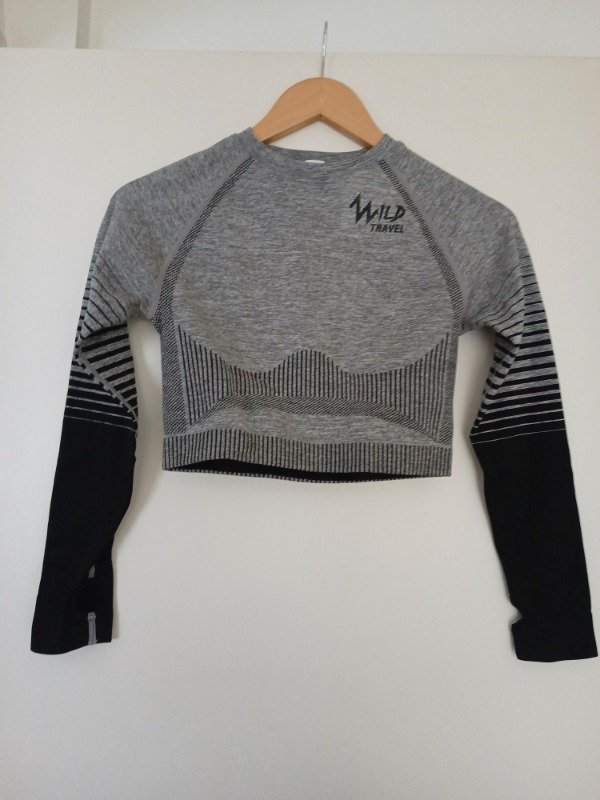 Producto - Remera deportiva importada Wild Travel