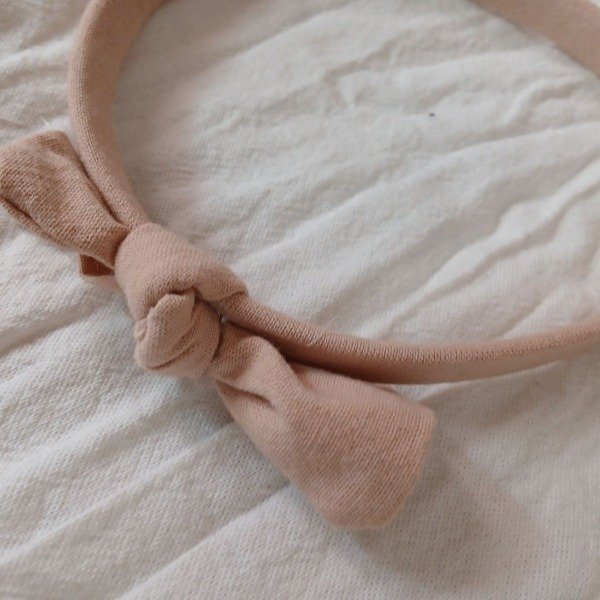 Producto - Vincha con moño rosa viejo