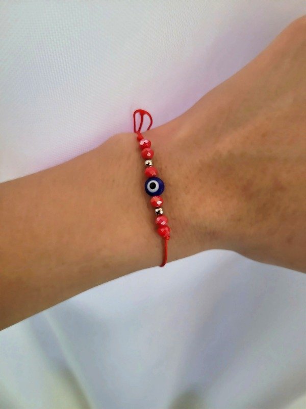 Producto - Pulsera de hilo rojo con ojito y bolitas rojas - Bijou