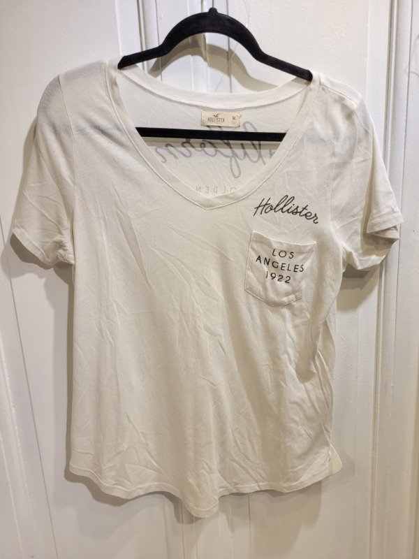 Producto - Remera KOWLOON blanca escote en v Talle M - PRECIO: 32X