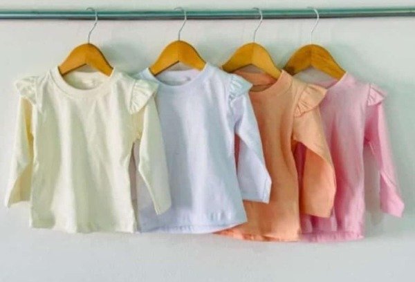 Producto - REMERA LISA CON VOLADO ALGODON PEINADO BEBA