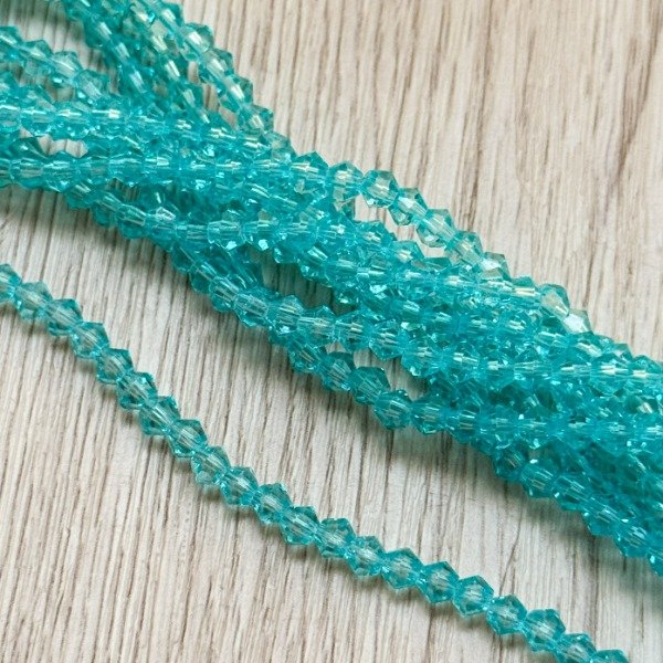 Producto - Tira de cristal Bicono Acqua Translúcido (4mm)