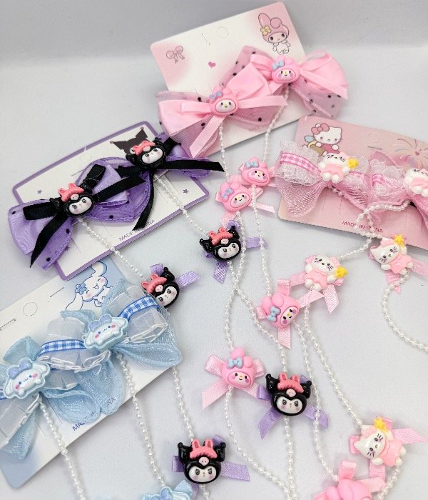 Producto - Hebillas Sanrio moño con perlas pack x12u(WA012)