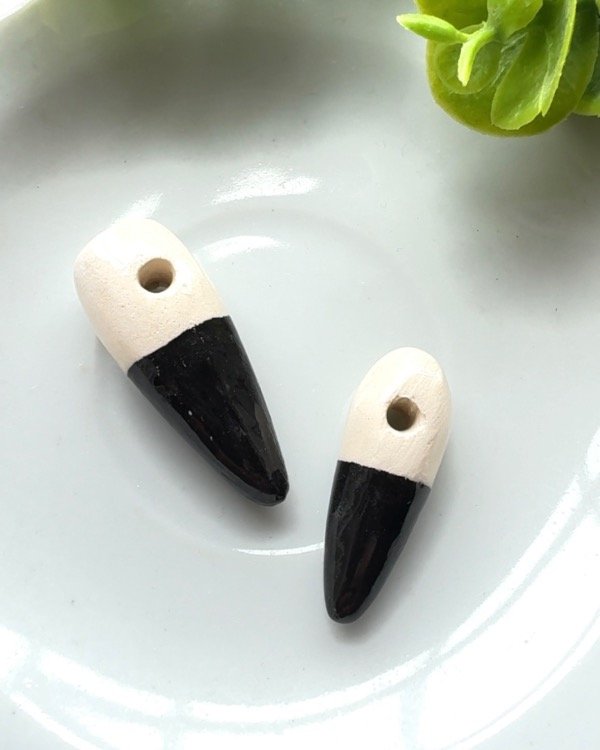 Producto - DIJE PUNTA IRREGULAR CHICO NEGRO