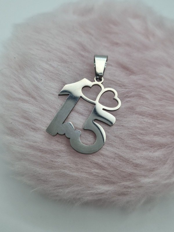 Producto - Dije acero quirurgico 15 años modelos varios