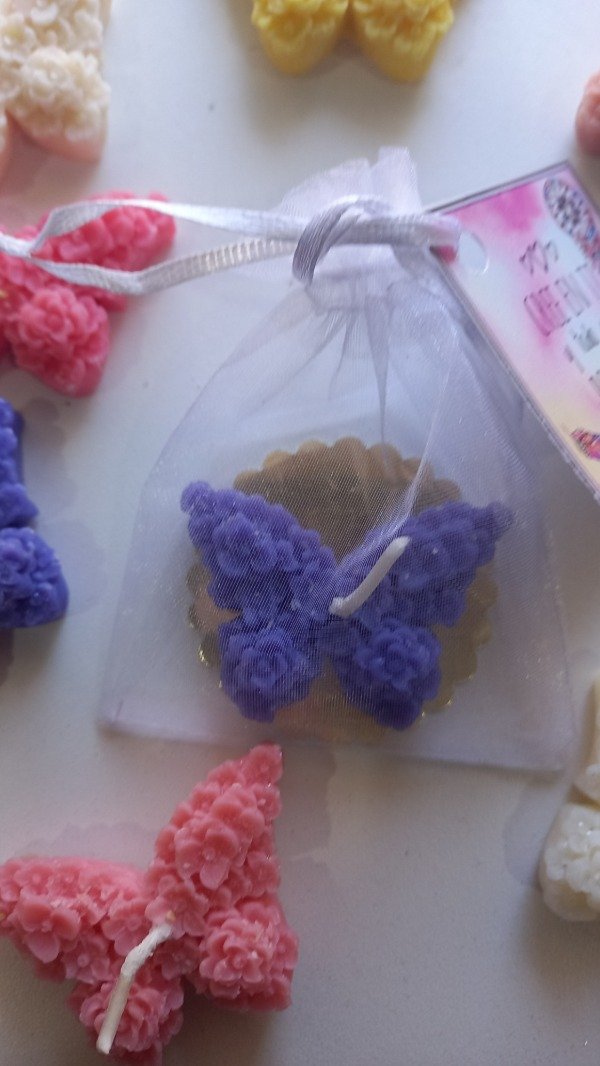 Producto - Mini mariposa perfumadacon bolsita de organza