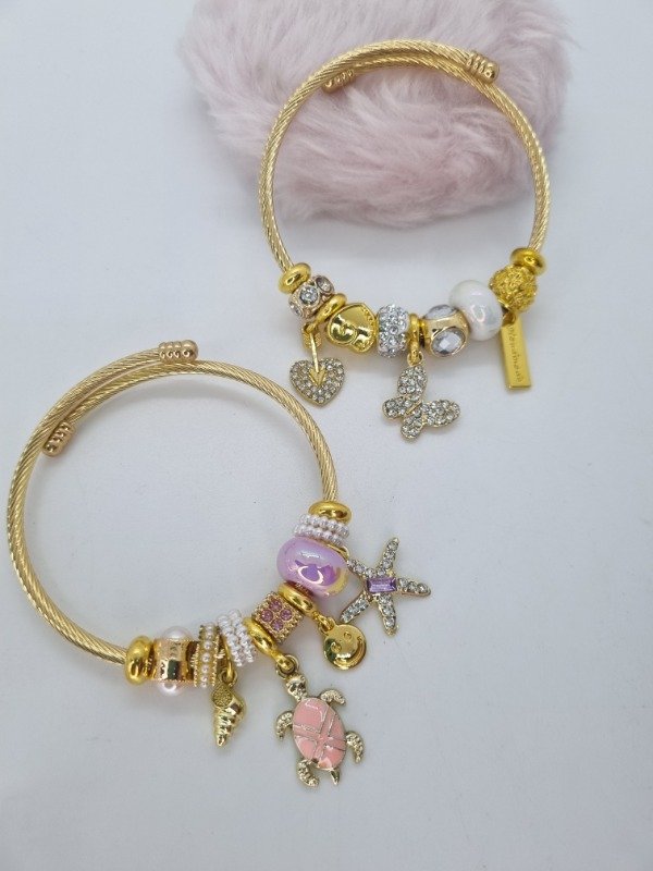 Producto - Pulseras charms acero dorado tipo Pandora cierre abierto