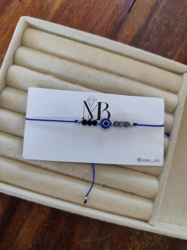 Producto - Pulsera ojito turco hilo azul.