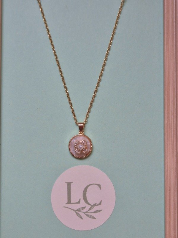 Producto - Collar giratorio flor circulo nacarado dorado