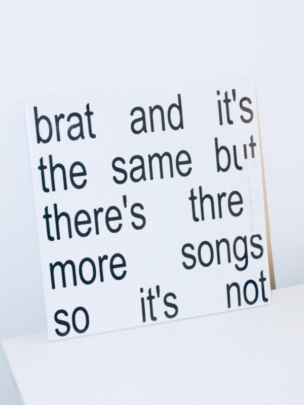 Producto - Brat and it's the same but there's three more songs so it's not - Charli Xcx