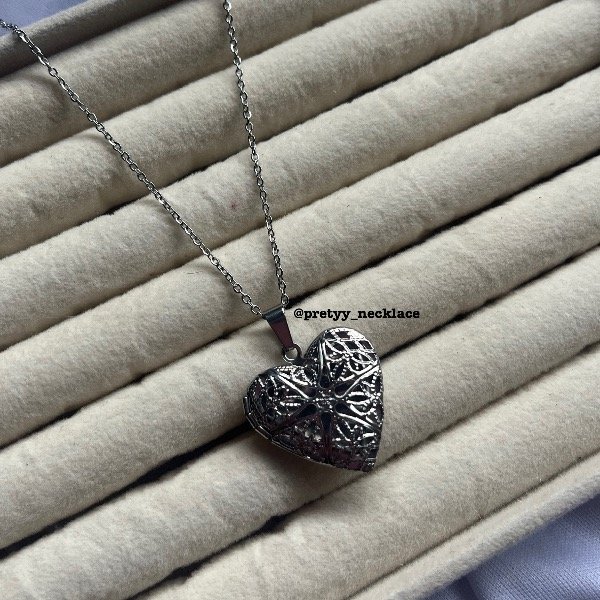 Producto - Relicario calado plateado
