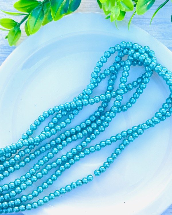 Producto - TIRA PERLA TURQUESA 4MM