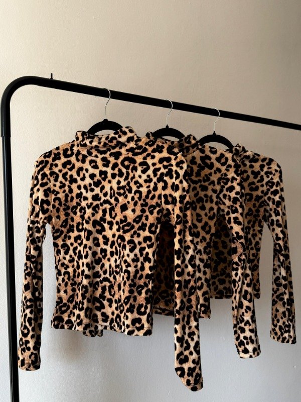 Producto - POLERA ANIMAL PRINT