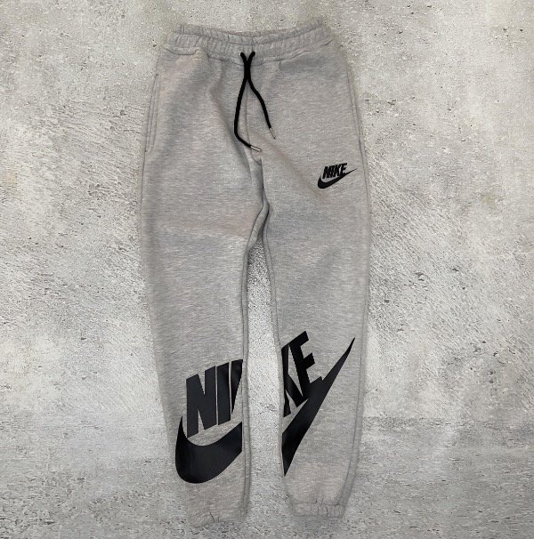 Producto - Pantalón Nike cortado gris