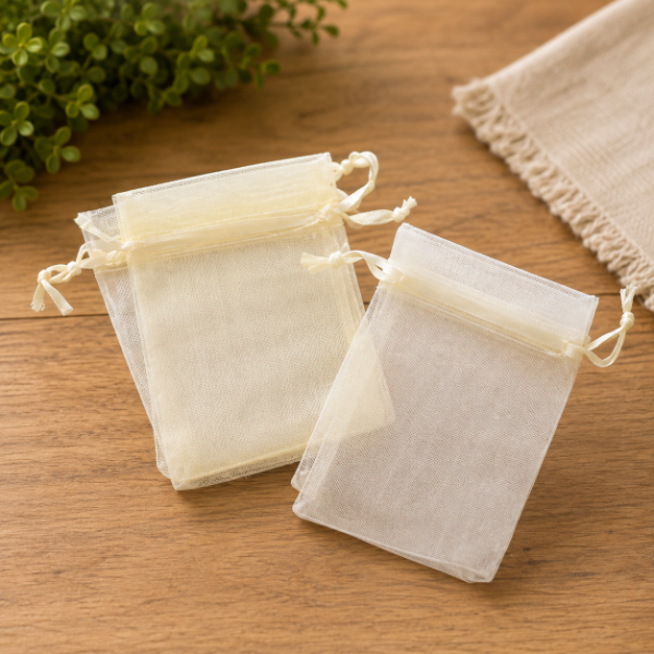 Producto - Bolsa de organza crema 7x9