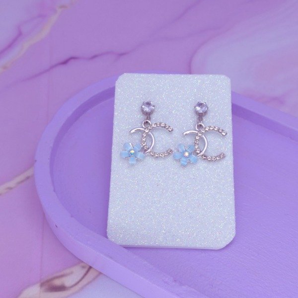 Producto - Aros pasante Chanel flor celeste AQ
