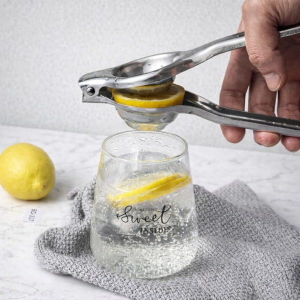 Producto - Exprimidor Limon De Acero