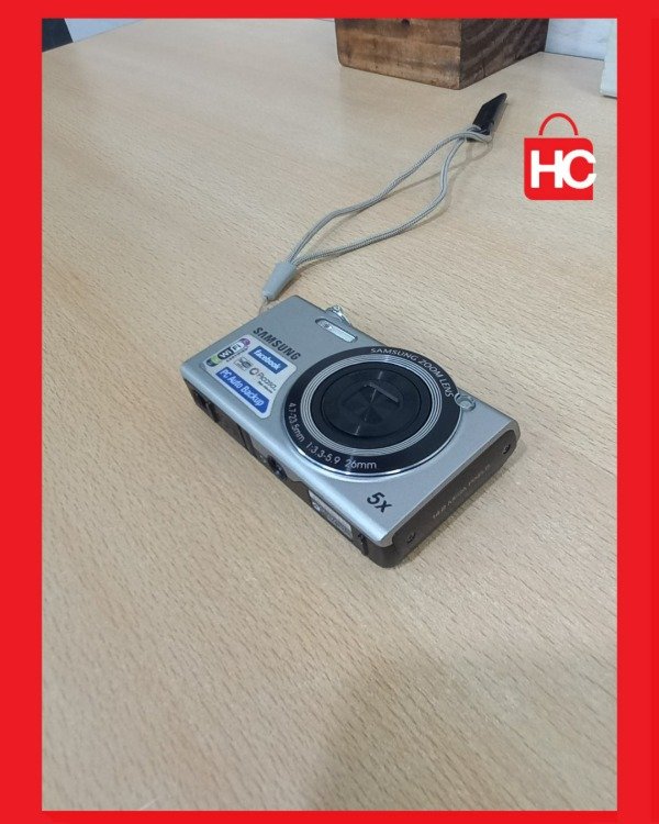 Producto - Cámara digital compacta Samsung SH100 con Wi-Fi - Completa con caja y funda - 5