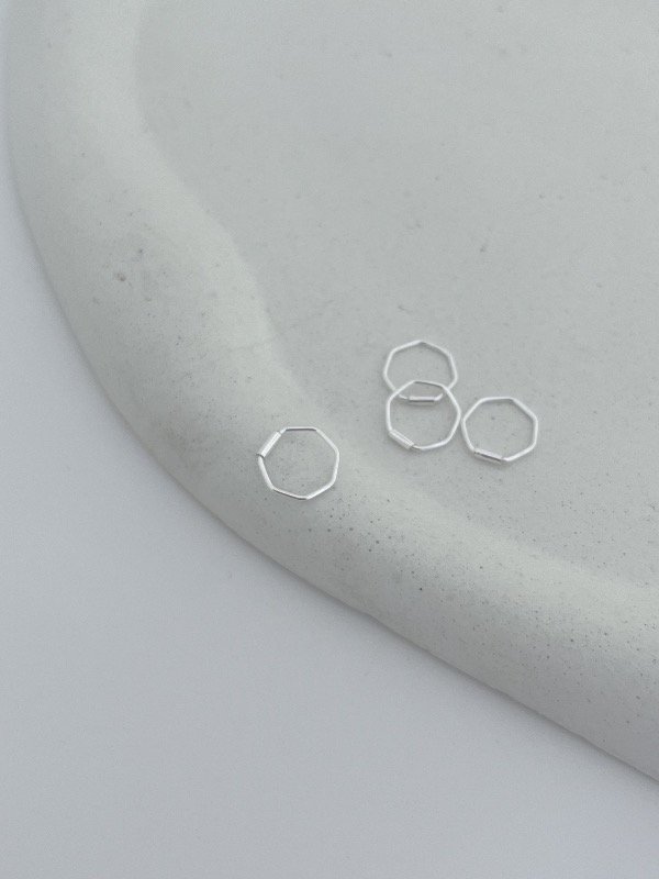 Producto - Piercing heptagono 0,8cm