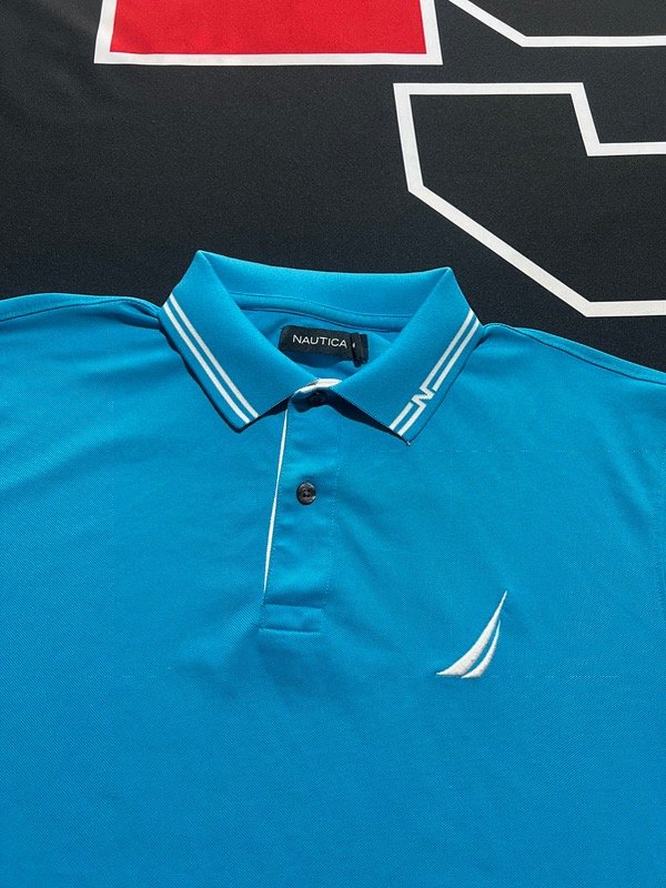 Producto - Chomba Nautica celeste. Talle M