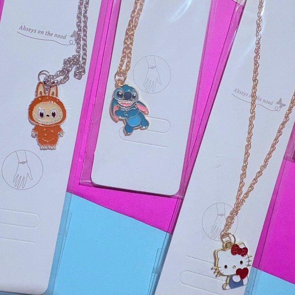 Producto - Cadena con dijes personajes 2x1