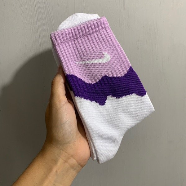 Producto - Media caña Nike derretida violeta