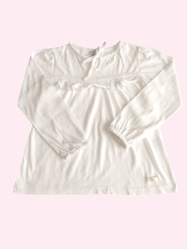 Producto - Remera manga larga blanca con volados Advanced 6 años