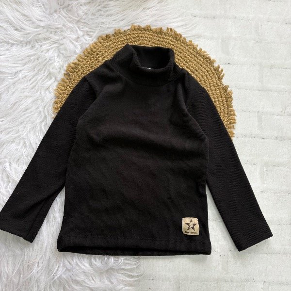 Producto - Polera en color negro talles hasta 3/4 años