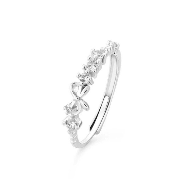 Producto - Anillo moño plata rodinada J2123
